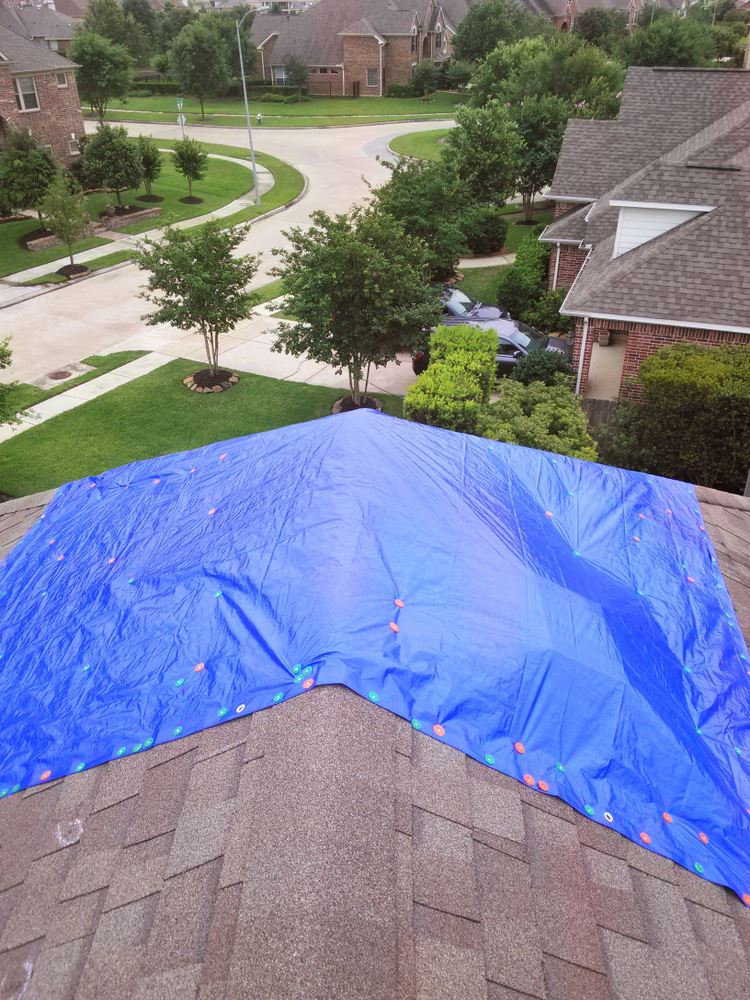 blue tarp on roof